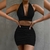Conjuto Gold - 2 peças de ternos para mulheres, top com cadarço e saia plissada que cobre o quadril. - comprar online
