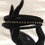 Pulsera Trenzada Elegancia Nocturna – Vinipiel Negra con Apliques Dorados