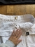 POLLERA BLANCA CARGO DE NOT en internet