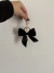 CHARM MOÑO NEGRO
