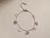 Pulsera acero con dijes y piedras colgantes