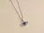 Cadena acero con dije bronce micropave ojito