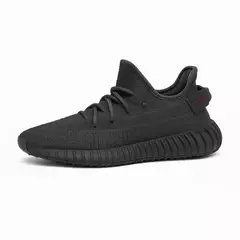 Zapas tipo Yeezy Gris detalle rojo en internet