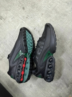DN negras con detalle verde