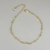 Pulseira Infantil de Bolinha com corrente Torcidinha Banhada no Ouro 18k na internet