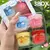Kit de Bálsamos Labiais Hidratantes Frutados - 4, 6 ou 8 Unidades | Lábios Macios, Cheirosos e Nutridos! na internet