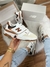 Tênis New Balance 550 Branco com detalhes em caramelo/marrom - comprar online