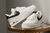 Tênis Nike Air Force 1 (AF1) Branco com detalhes em preto