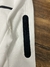 Conjunto Nike Tech Fleece - Branco com preto na internet