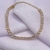 Pulseira strass dourado