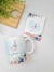 Caneca e bloco de anotações