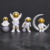 Mini Estátua Astronauta Decorativa em Resina – 9cm - loja online
