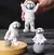 Mini Estátua Astronauta Decorativa em Resina – 9cm na internet