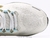 Tênis Nike Vomero 18 - Branco e Dourado - comprar online