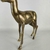 Estatueta de veado em bronze. na internet