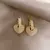 Brincos Coração com detalhes em Pérolas. - Valentina Store
