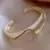 Pulseira Design de Onda Dourada. - comprar online
