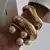 Trio Braceletes Dourados na internet