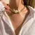 Choker Corrente Cubana Detalhe em Pérolas - loja online