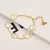 Pulseira Ajustável Aço Inoxidável Banhada a Ouro com Elegante Design de Flor. - Flev d'Or