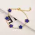 Pulseira Ajustável Aço Inoxidável Banhada a Ouro com Elegante Design de Flor. - loja online