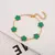 Pulseira Ajustável Aço Inoxidável Banhada a Ouro com Elegante Design de Flor. - loja online