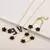 Pulseira Ajustável Aço Inoxidável Banhada a Ouro com Elegante Design de Flor. - Flev d'Or