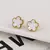 Pulseira Ajustável Aço Inoxidável Banhada a Ouro com Elegante Design de Flor. - Flev d'Or