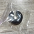 Cuff negro grande redondo con rayas