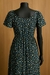 vestido de flores preto e verde e azul na internet