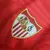 Camisa Sevilla II 23/24 - Torcedor Castore - Vermelha com ondulações cinza e dourado - Camisa 12 Store