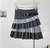 Falda de bolados y cinturón negro y gris - comprar online