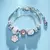 Bonito novo sanrio olá kitty pulseira rosa frisado diamante anime mão ornament - COLMEIA STORE