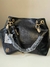Bolsa Lucia + porta cartão-preto na internet