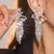 Brincos Laço Strass – Luxo Delicado com Toque Romântico - loja online
