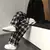 Calça preta xadrez oversized - comprar online