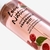Frasco de fragancia corporal energizante con menta y frambuesa de Love Nature.