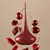 Perfume JoyceLove Potion Cherry para mujer con frascos rojos y cerezas frescas alrededor