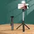 Tripé sem fio Bluetooth Selfie Stick para iPhone Samsung Xiaomi - Drinow Tem
