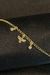 Tornozeleira com Pingente de Espirito Santo Banhado em Ouro 18k - comprar online