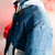 Imagen de Chaqueta mini supra en escala de jean, azul, blanco y rojo con nueve bolsillos a partir de material recuperado
