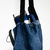 Portabotellas de upcycling en tonos oscuros en internet