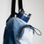 Imagen de Portabotellas de upcycling en tonos oscuros