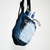 Imagen de Portabotellas de upcycling en tonos oscuros