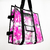 Totebag transparente con plumas rosadas
