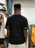 Camiseta Preta Unissex na internet