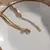 Elegância em Cada Detalhe - Colar de Camadas Banhado a Ouro 18K na internet