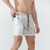 Shorts masculinos de secagem rápida, respiráveis, com zíper e bolsos