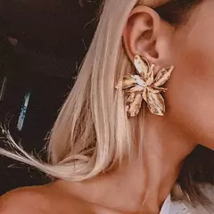 Imagen de Pendientes de flores de Metal con textura mate. Varios estilos.