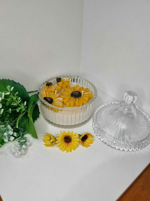 Vela no bombonier com flores de margaridas